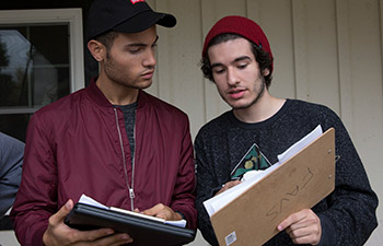Two Film Students working on a project