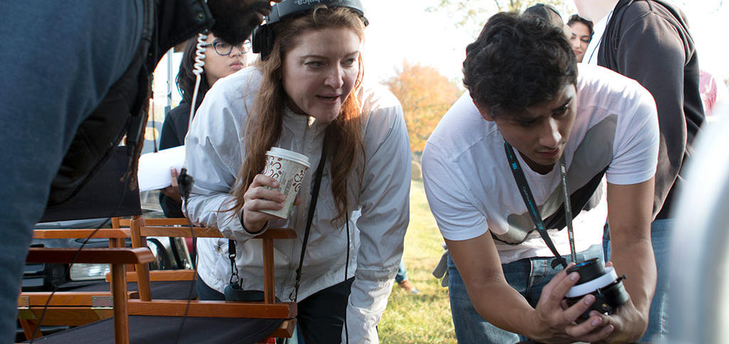 Students work on set with writer, director, and television series creator Colette Burson on location. Photo: Sarah Heaton.